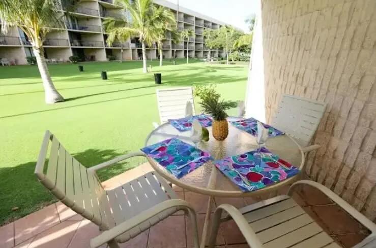 Updated living room with hard-surface flooring inside Maui Sunset A103