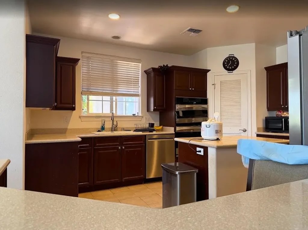 Kitchen with cabinetry and appliances inside the home at 10 Kamaiki Circle in Kahului