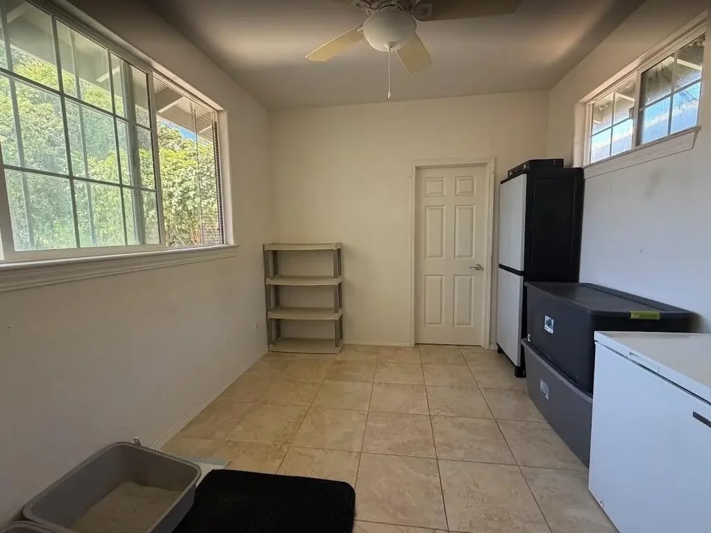 Two-car garage and driveway at the Maui Lani home for sale at 10 Kamaiki Circle