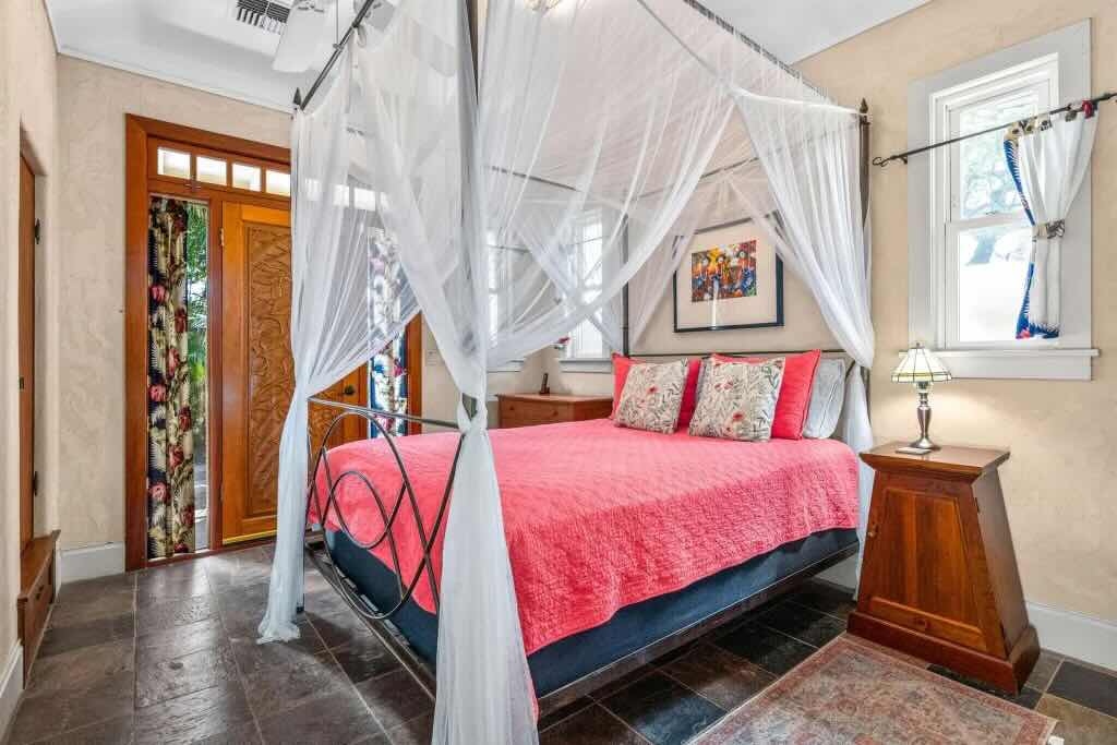 Mahogany wood details and hand-carved doors inside the South Kihei home