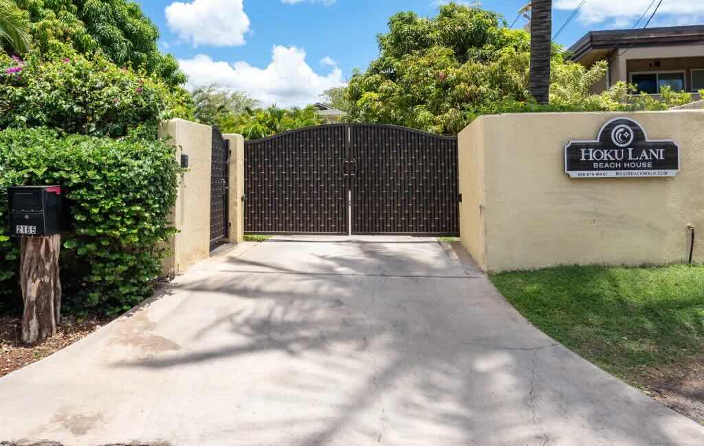 Mature tropical landscaping and fruit trees surrounding 2165 Iliili Rd in Kihei