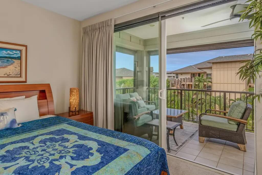 Bedroom inside the two-bedroom Ke Alii Ocean Villas K-202 condo in Maui