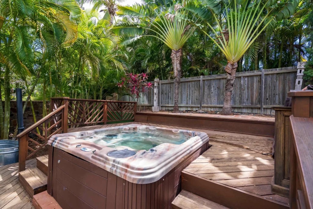 Tropical landscaped yard and outdoor area at 2627 Lioholo St in Kihei