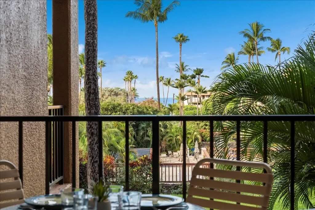 Private lanai with partial ocean views at Kamaole Sands 5-205