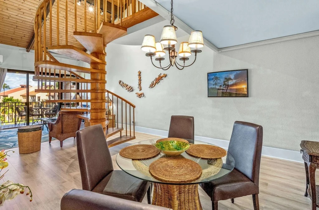 Kitchen with granite countertops and stainless steel appliances at Kamaole Sands Unit 6-402