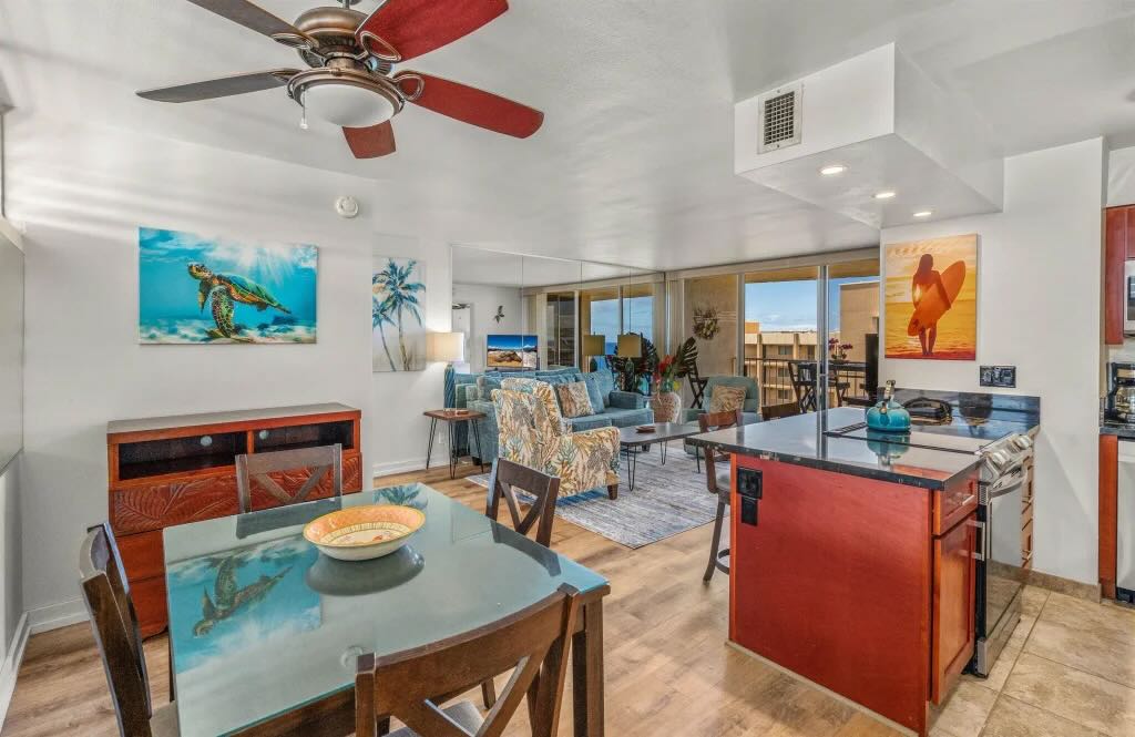 Remodeled living area with ocean views inside Royal Kahana 1215 in West Maui