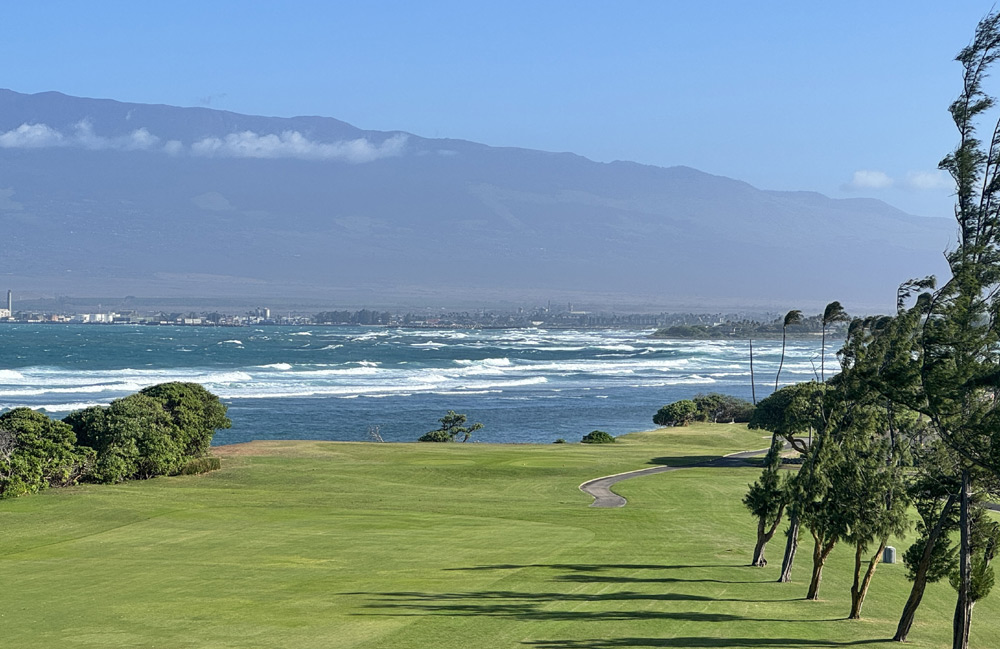 Waiehu Beach Park shoreline in Central Maui with ocean views and open grassy park space