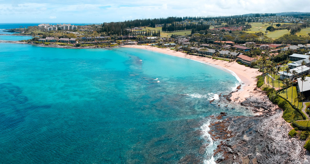 The tropical blue waters of Napili Bay Maui Hawaii